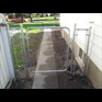 thumbnail Chain link gateway and sidewalk.
